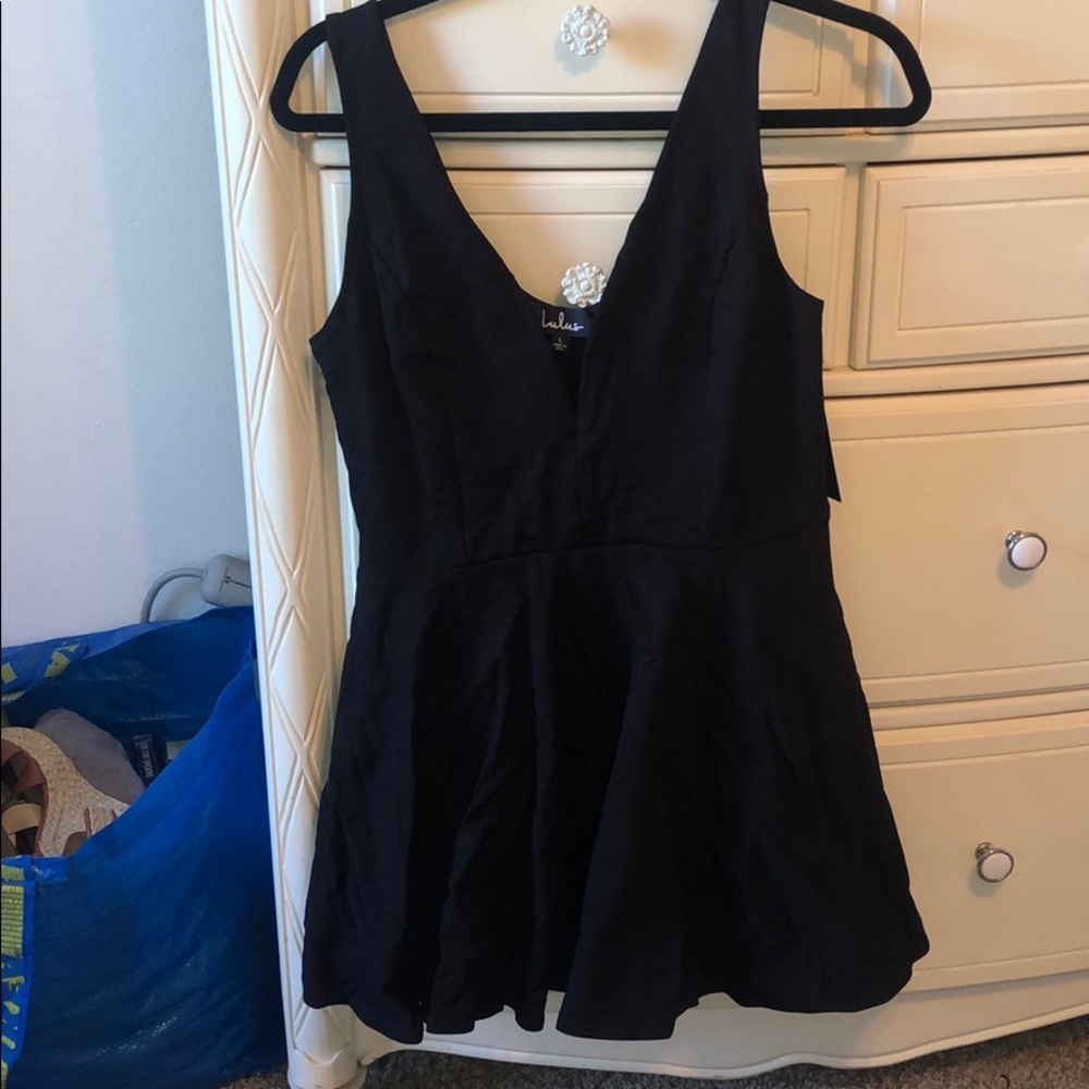 Lulu’s black dressy romper with low cut front